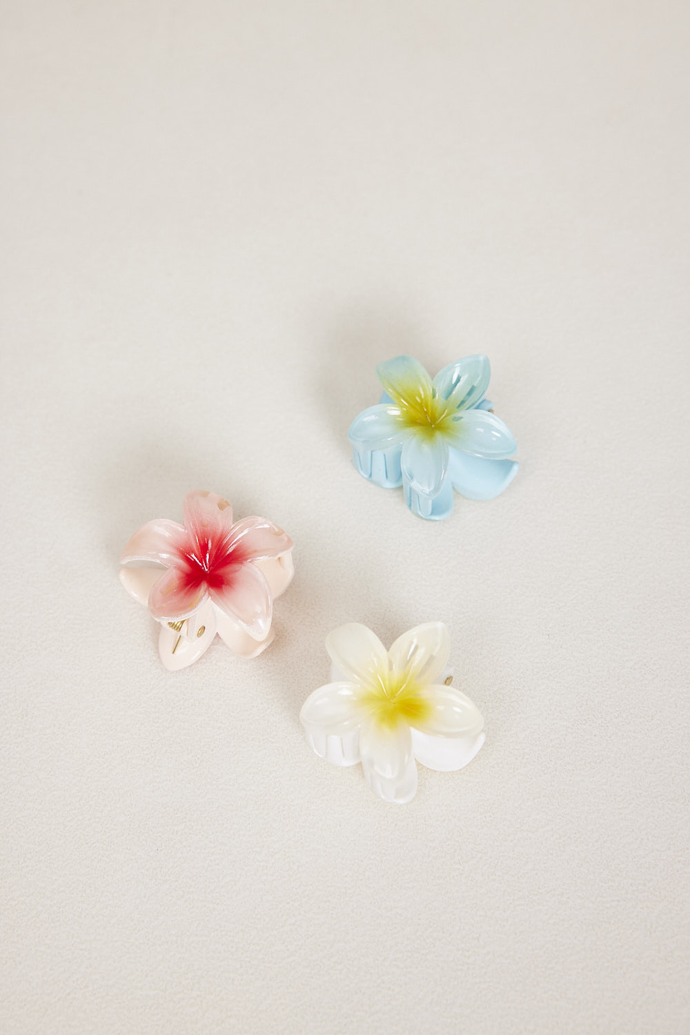 קליפס הוואי קטן תכלת,ורוד בהיר,לבן צהוב